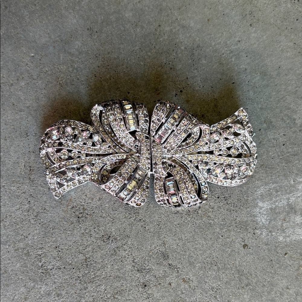 Elegant Silver colored Crystal Brooch